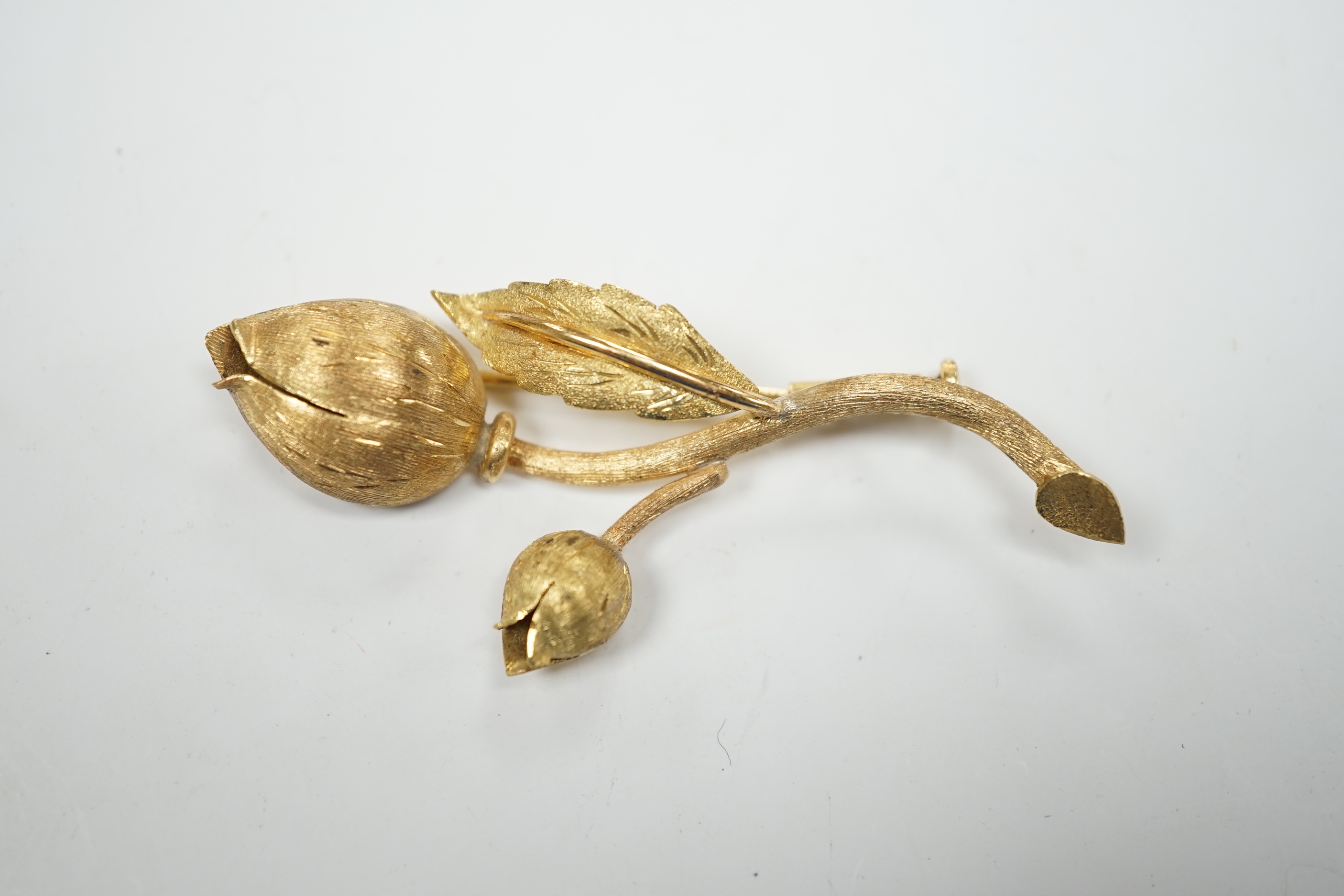 A textured yellow metal flower bud brooch, 60mm, 10.5 grams.
